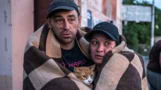 Местные жители в Херсоне после эвакуации из зоны затопления