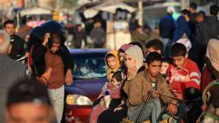 Палестинцы возвращаются в свои дома на юге сектора Газа