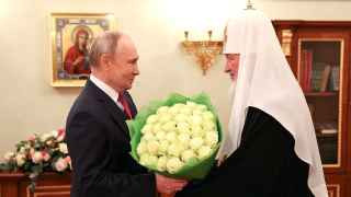 Патриарх Кирилл и Владимир Путин