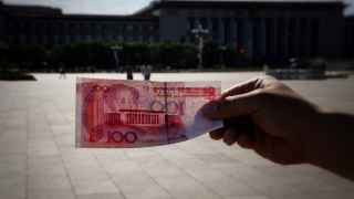 Аналитики предвидят ослабление китайской валюты