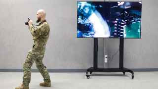 Посетитель во время открытия «ЧВК Вагнер центр»