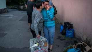 Местные жители в Херсоне после эвакуации из зоны затопления